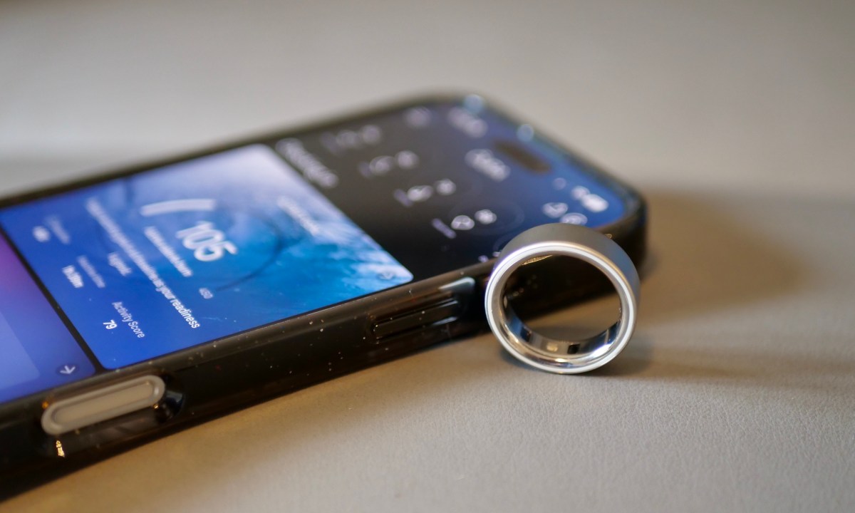 The Oura Ring 4 alongside the Apple iPhone 16 Pro Max.