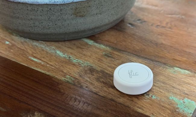 The Flic Smart Button on a table.