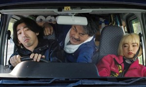 Three people ride in a van in Perfect Days.