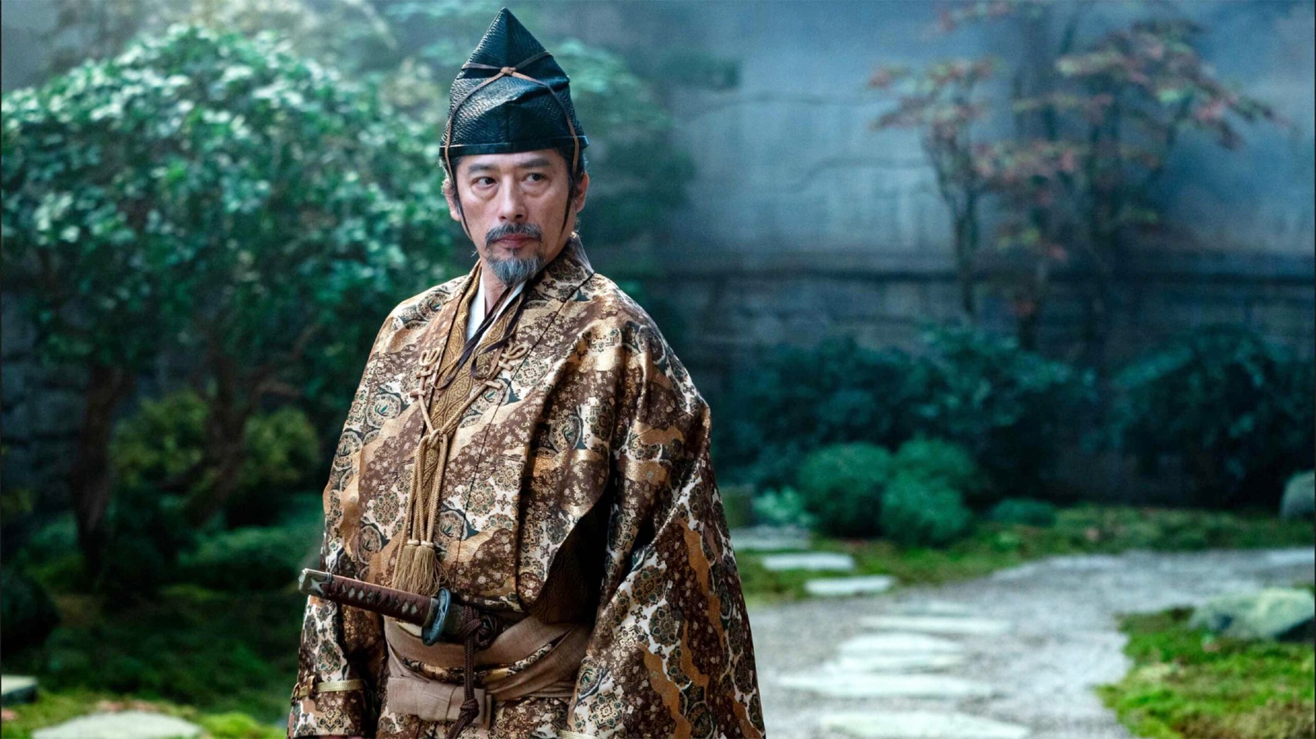 A man sits on the floor in Shogun.