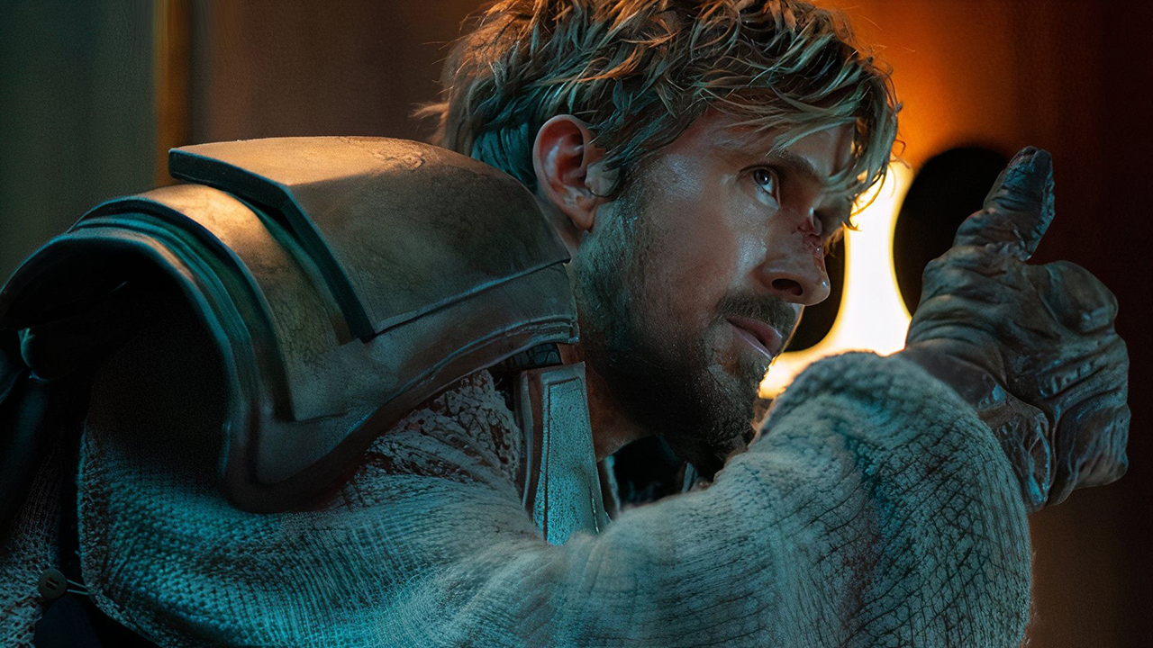 Ryan Gosling crouched down in The Fall Guy, giving a thumbs up