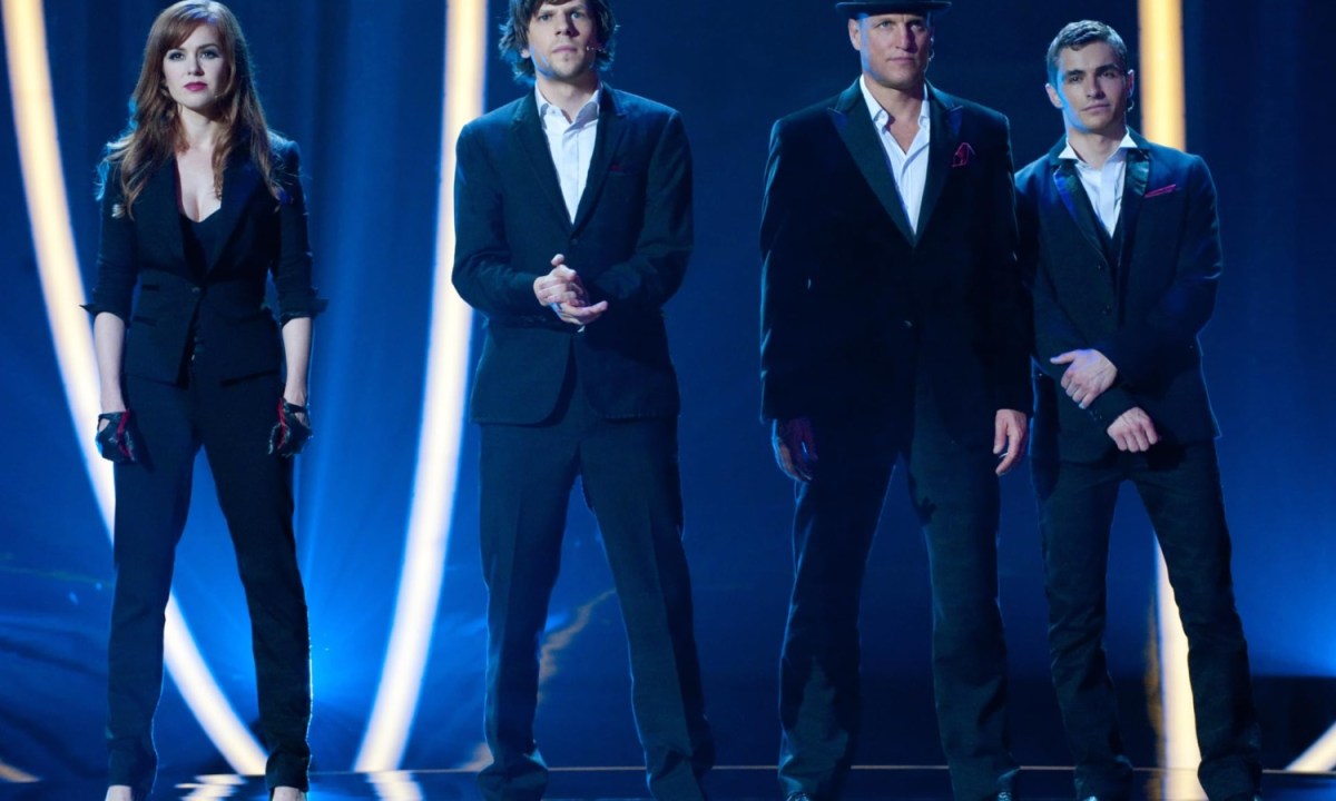 Four magicians stand next to each other in Now You See Me.