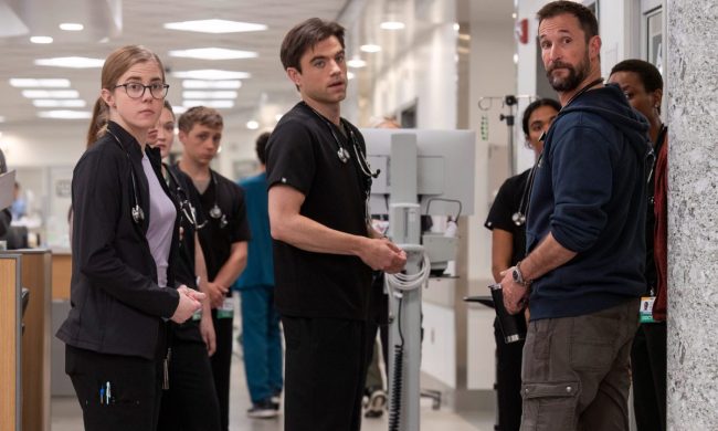 Patrick Ball stands next to Noah Wyle in The Pitt.