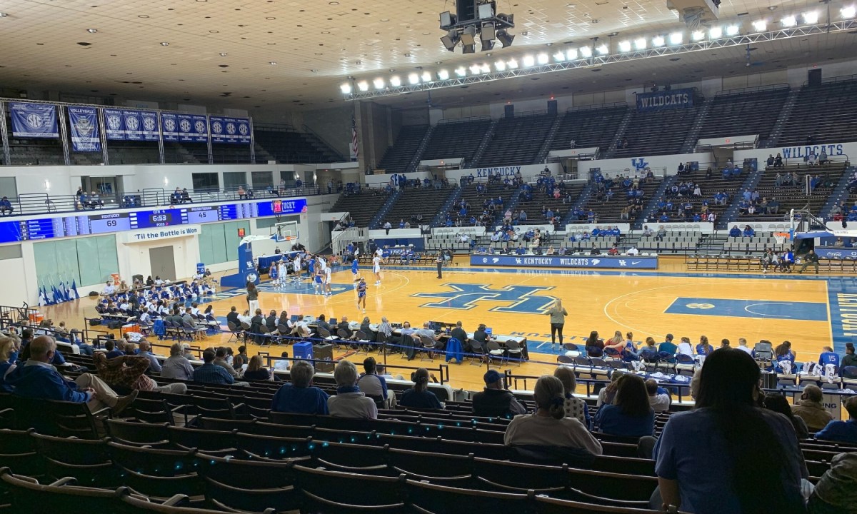 Basketball players on the court at Memorial Coliseum.