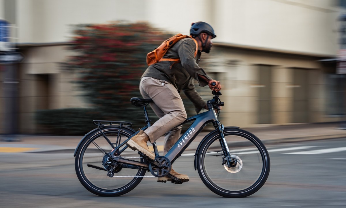 A man riding the Aventon Level 3 Commuter Ebike.