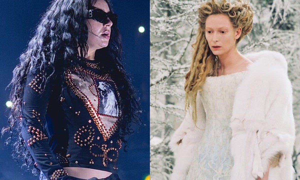 Charli XCX holds a mic while the ice queen stares.