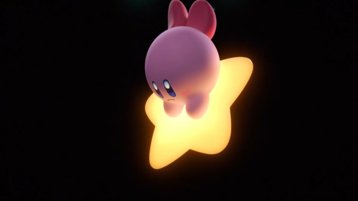 Kirby holding onto a star in Kirby Air Riders.