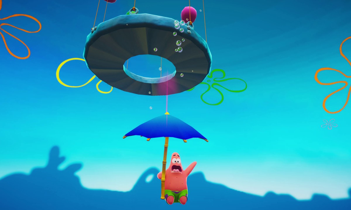 Patrick using an umbrella to parachute.