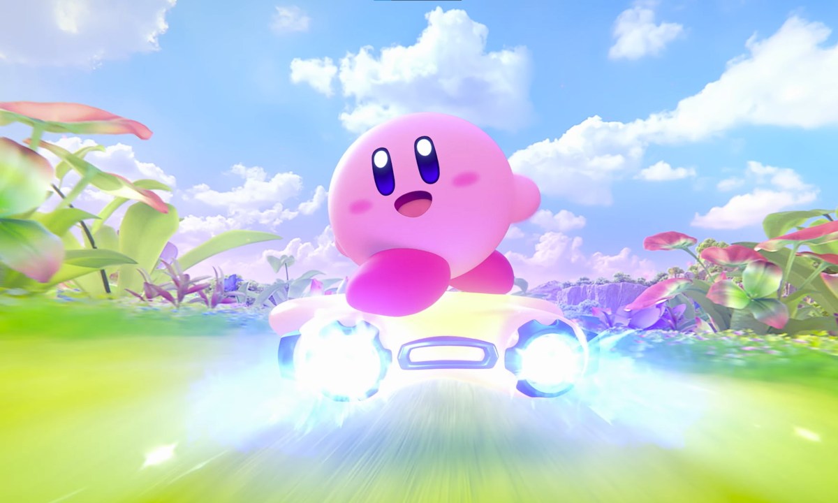 Kirby riding on a flying star looking back towards the camera